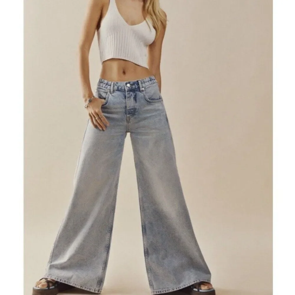 NWT FREE PEOPLE LOVEFOOL LOW RISE JEANS IN LIGHT TRUE BLUE